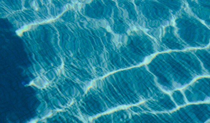 Close up picture of water from a pool.